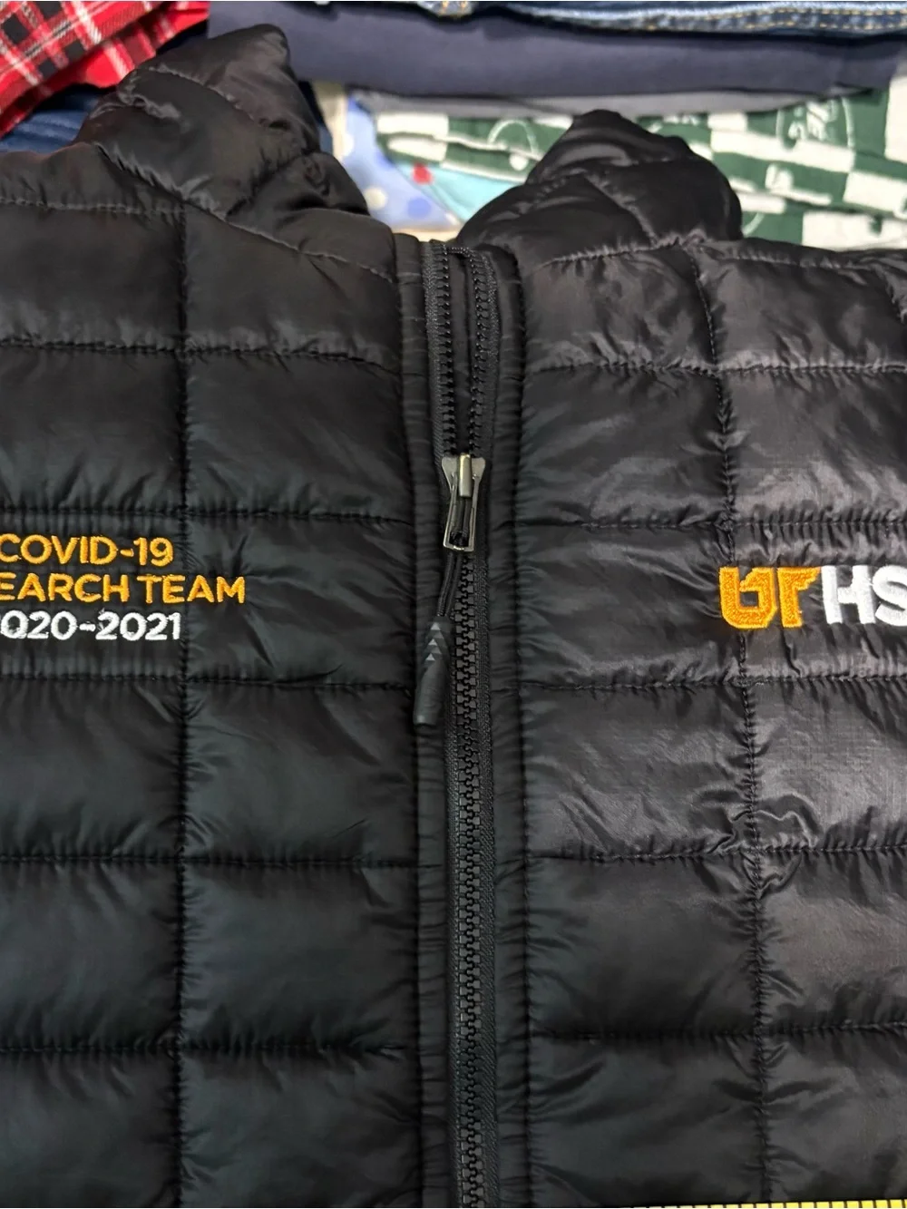 The North Face Black Quilted Puffer Vest with UT HSC Embroidery